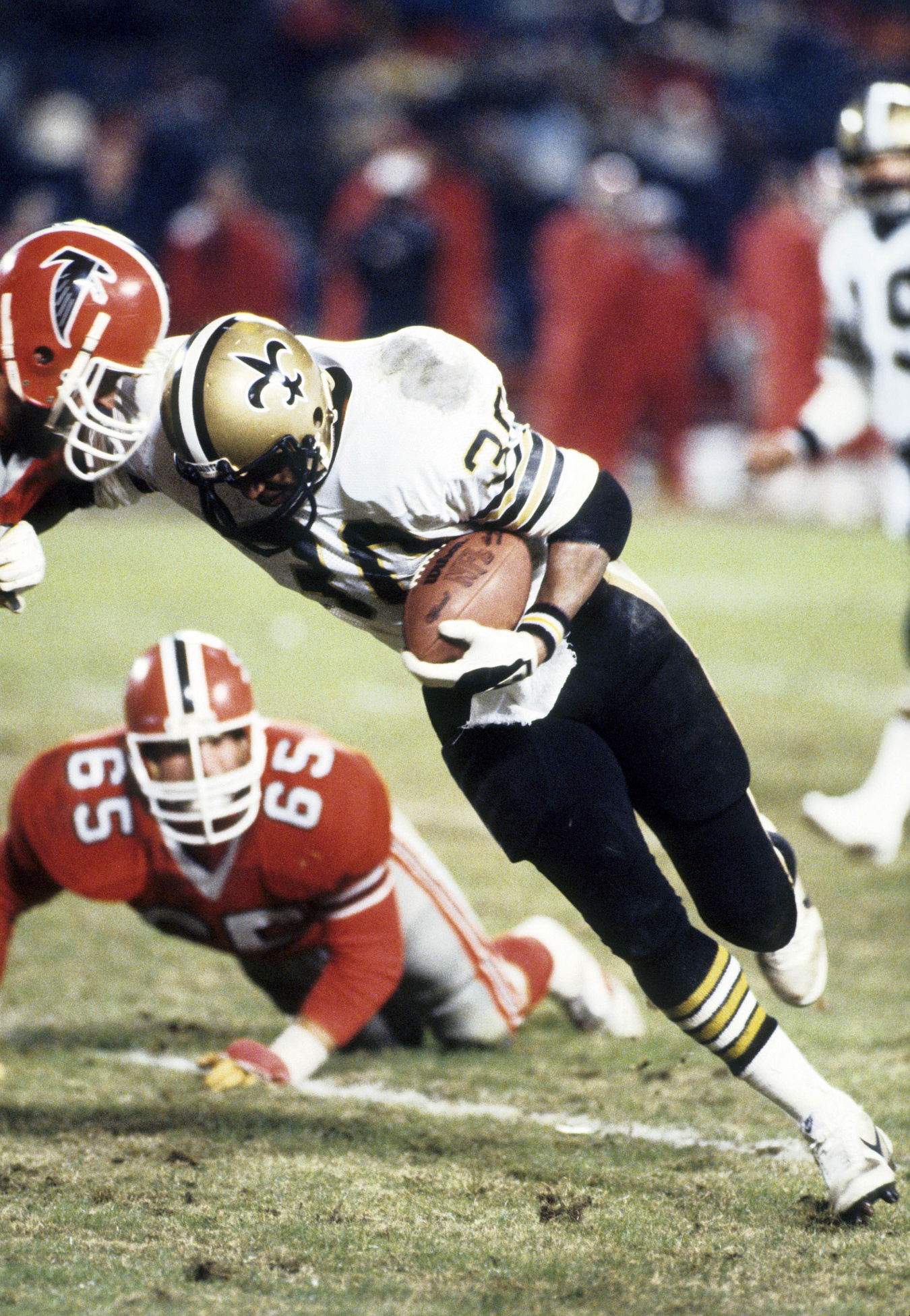 Dec 12, 1982; Atlanta, GA, USA; FILE PHOTO; New Orleans Saints running back Wayne Wilson (30) in action against the Atlanta Falcons at Fulton County Stadium. Mandatory Credit: Manny Rubio-USA TODAY Sports